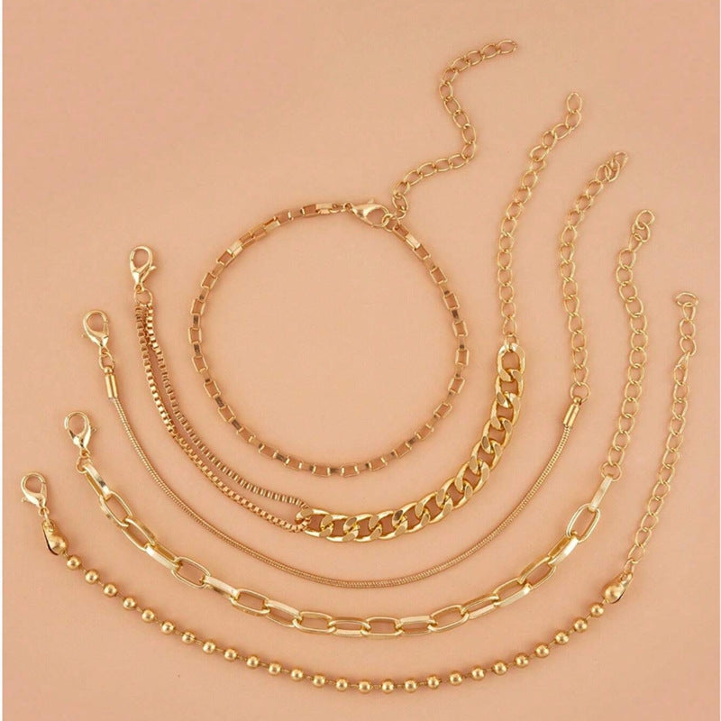 A golden six-piece set Chic Multi-Layered Alloy Bracelet Set - Fashionable Stackable Jewelry