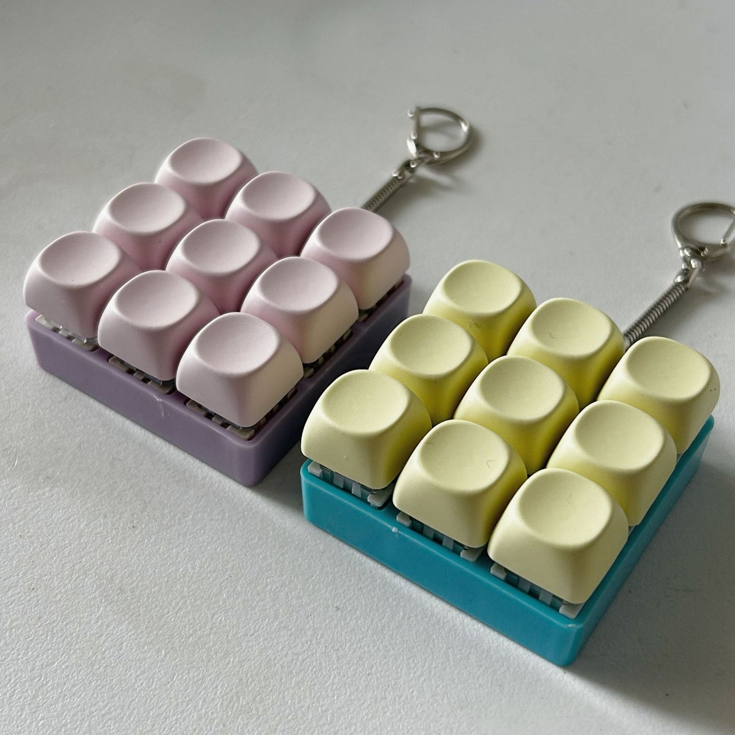 2-Pack Light Blue Mechanical 9-Keyboard Fingertip Toy Keychain - Key Pressure Relief, PVC Fingertip Toy